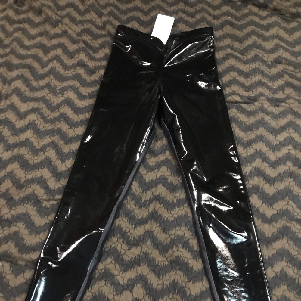 Blackmilk never worn Black slicks small w tags